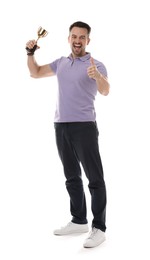 Photo of Happy winner with golden trophy cup showing thumbs up on white background