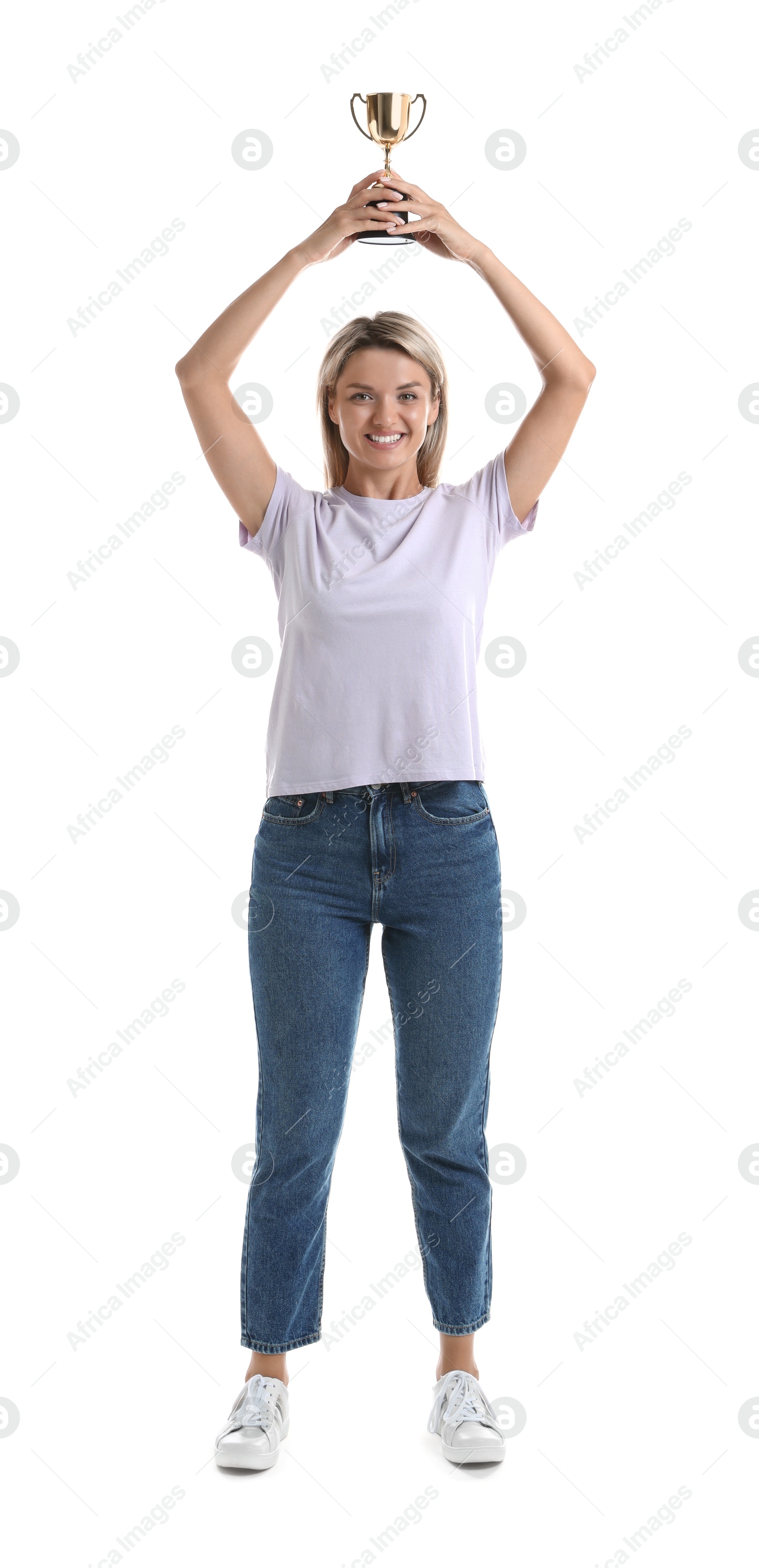 Photo of Happy winner with golden trophy cup on white background