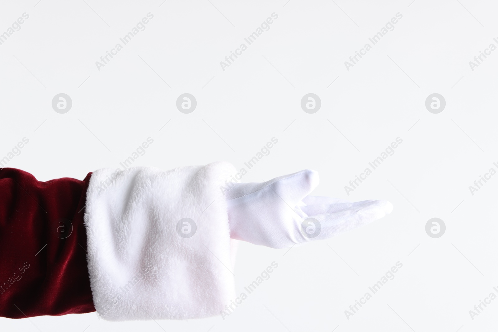 Photo of Santa Claus holding something on white background, closeup