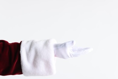 Photo of Santa Claus holding something on white background, closeup