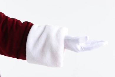 Photo of Santa Claus holding something on white background, closeup