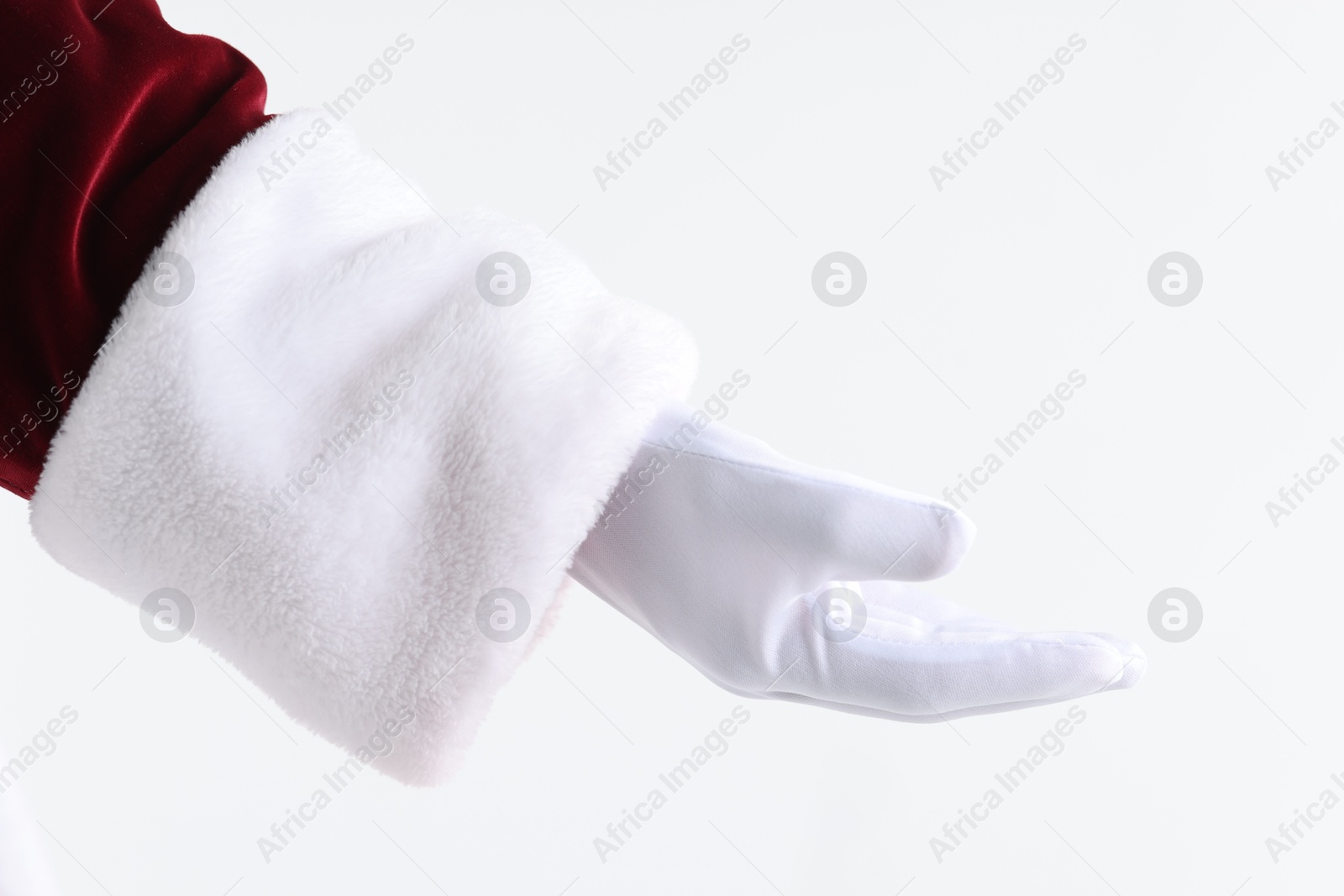 Photo of Santa Claus holding something on white background, closeup