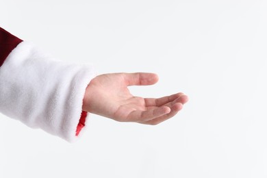 Photo of Santa Claus holding something on white background, closeup