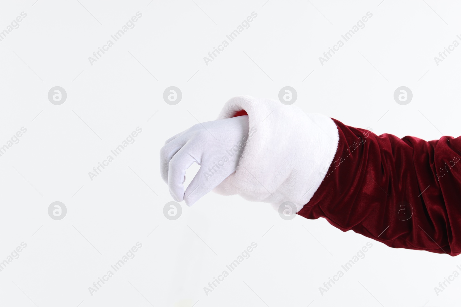 Photo of Santa Claus holding something on white background, closeup. Space for text