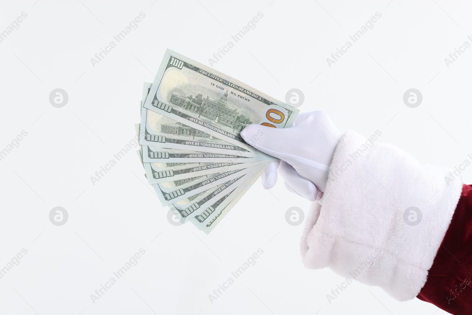 Photo of Santa Claus holding dollar banknotes on white background, closeup