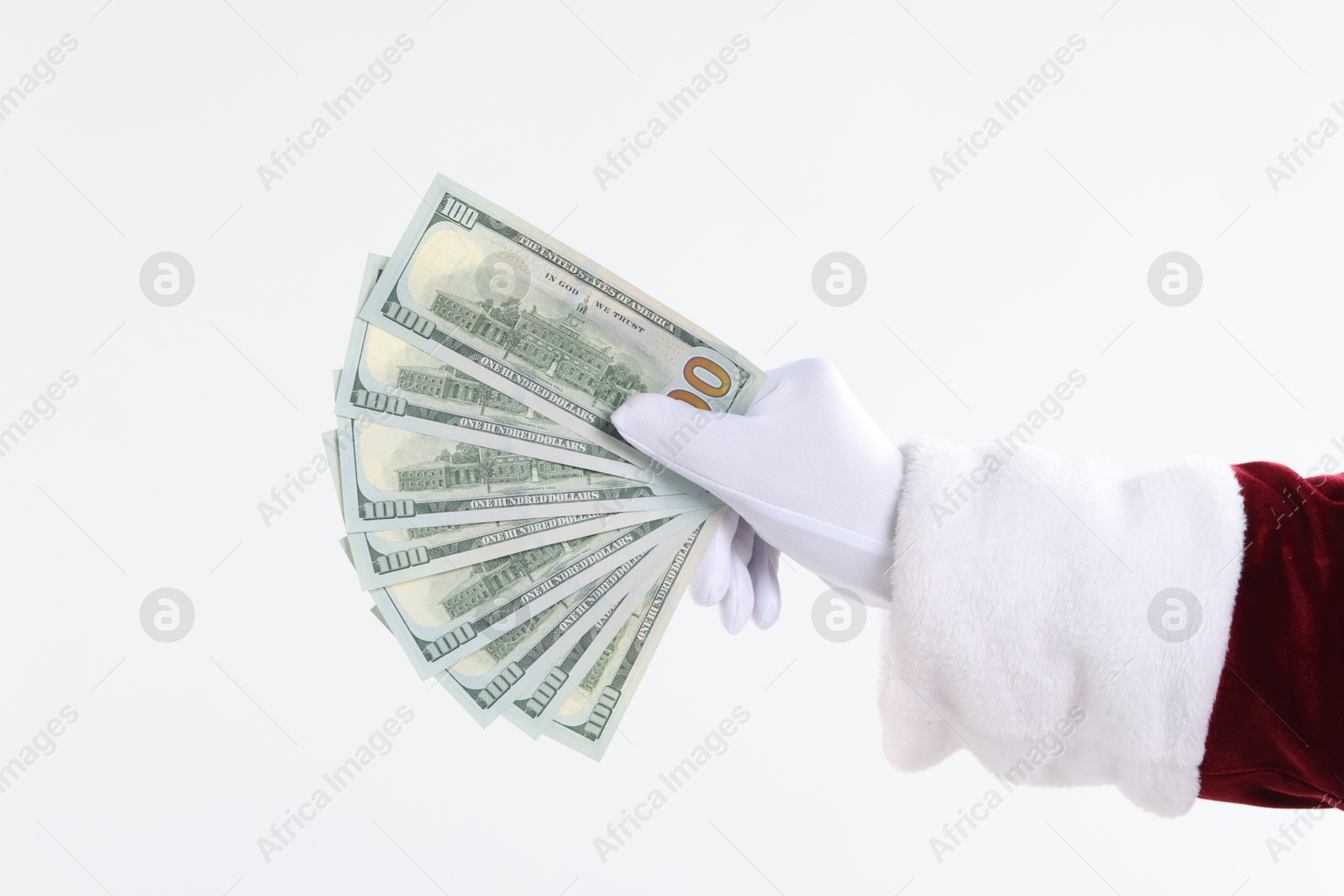 Photo of Santa Claus holding dollar banknotes on white background, closeup