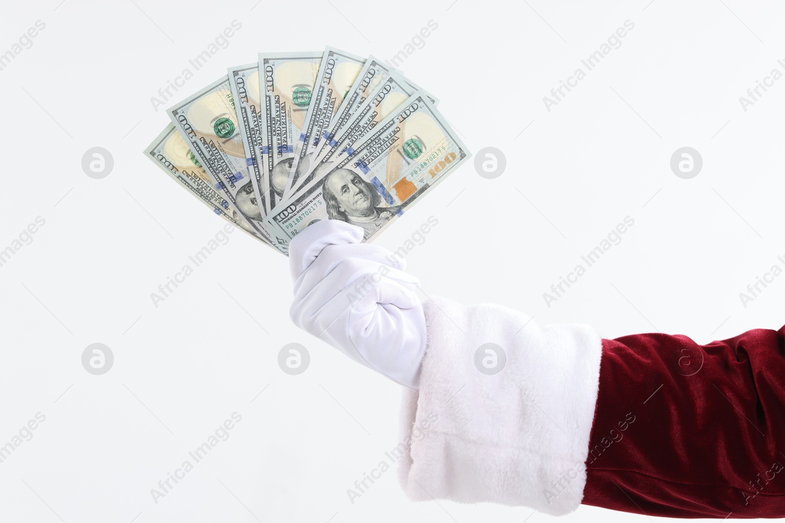 Photo of Santa Claus holding dollar banknotes on white background, closeup