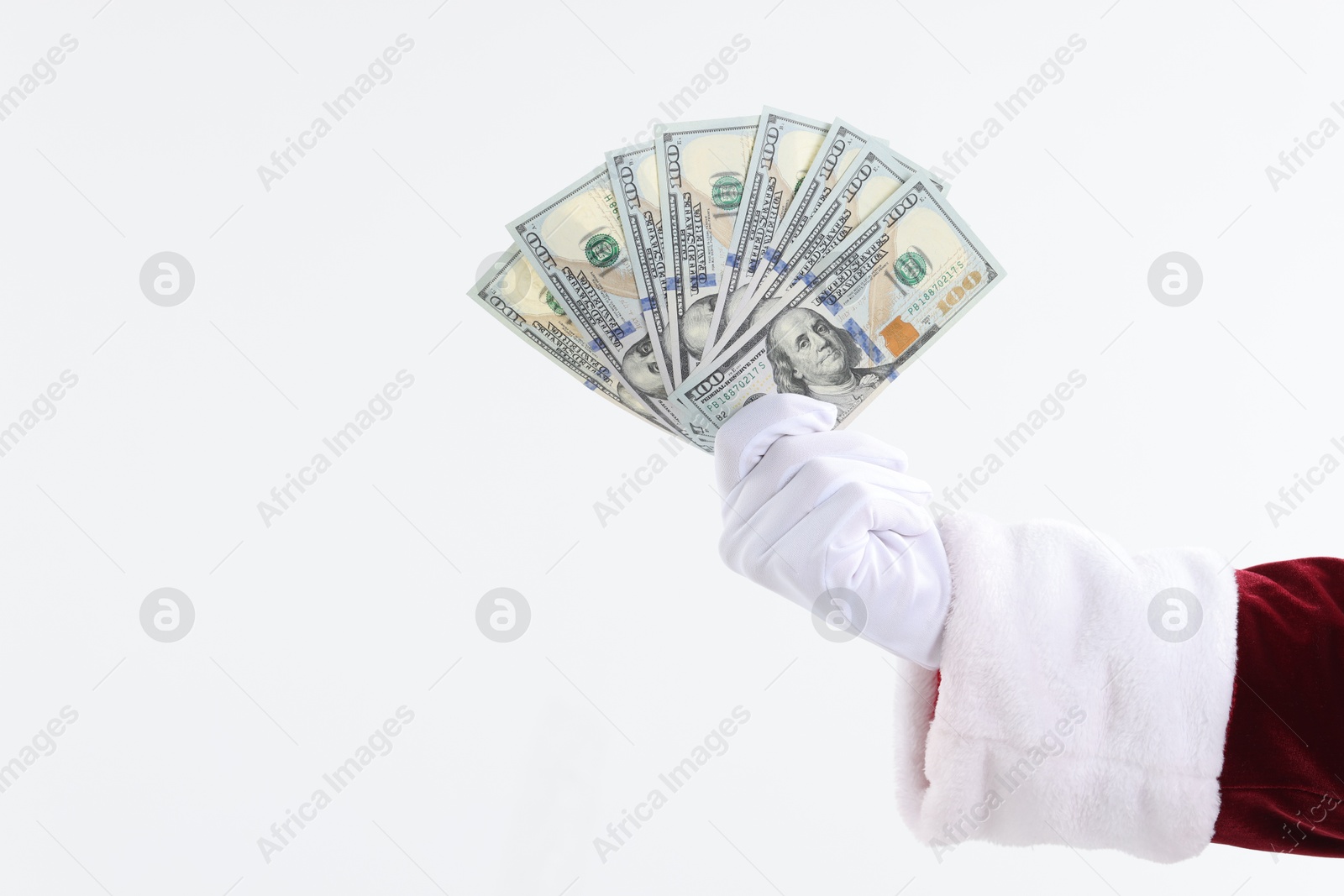 Photo of Santa Claus holding dollar banknotes on white background, closeup