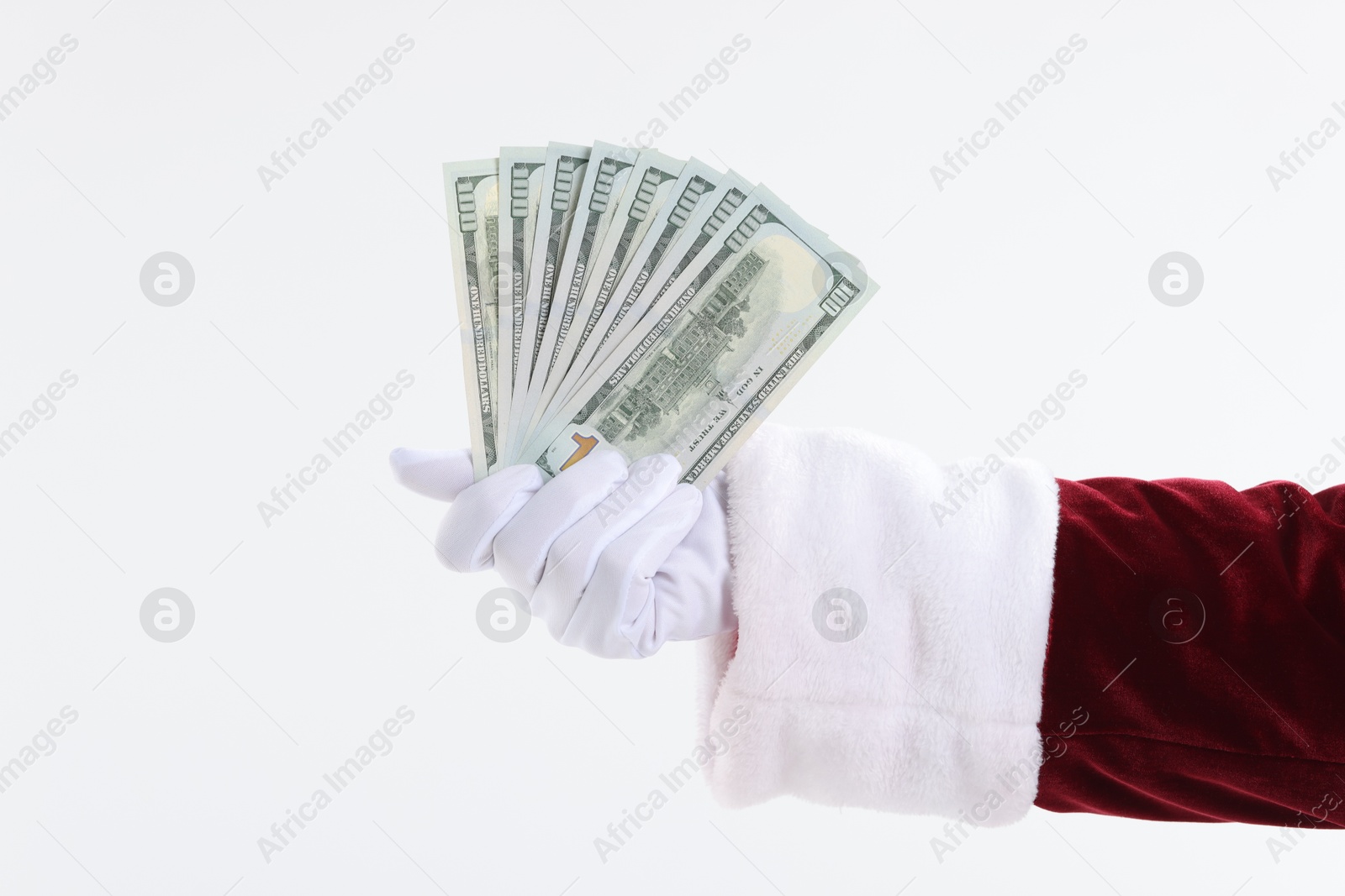 Photo of Santa Claus holding dollar banknotes on white background, closeup