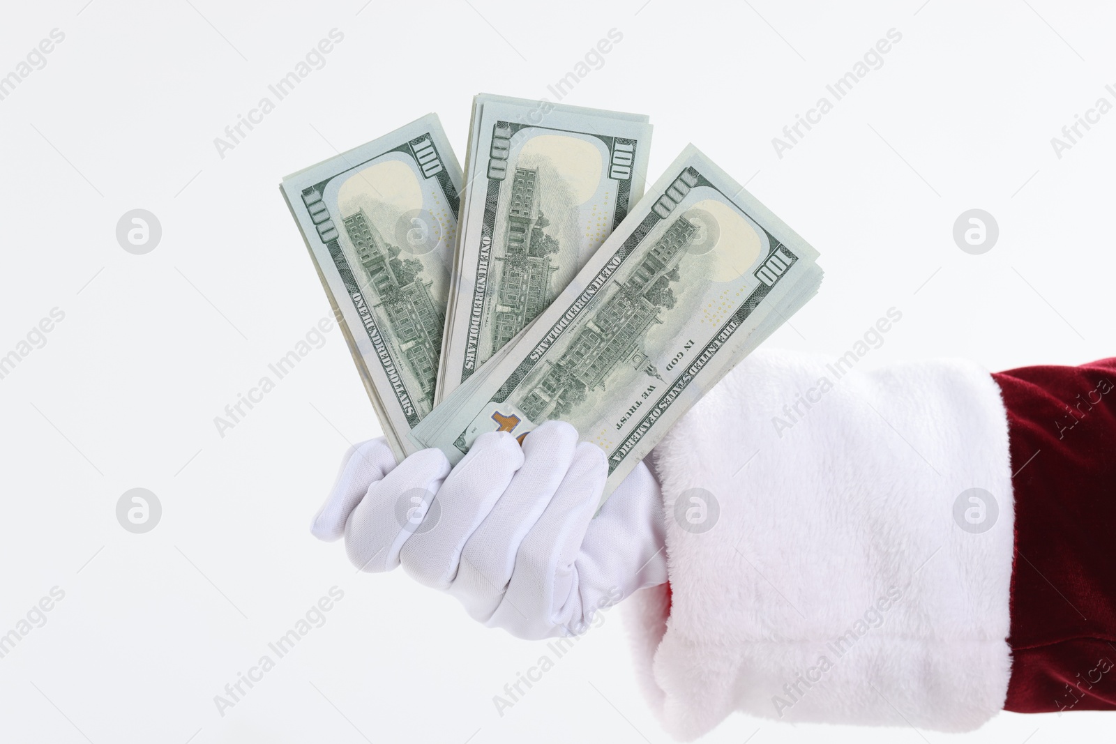 Photo of Santa Claus holding dollar banknotes on white background, closeup