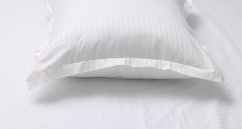 Bed with white clean linens and pillow