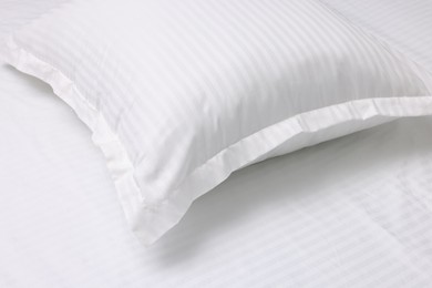 Bed with white clean linens and pillow