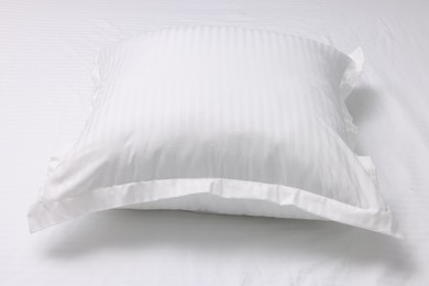 Bed with white clean linens and pillow