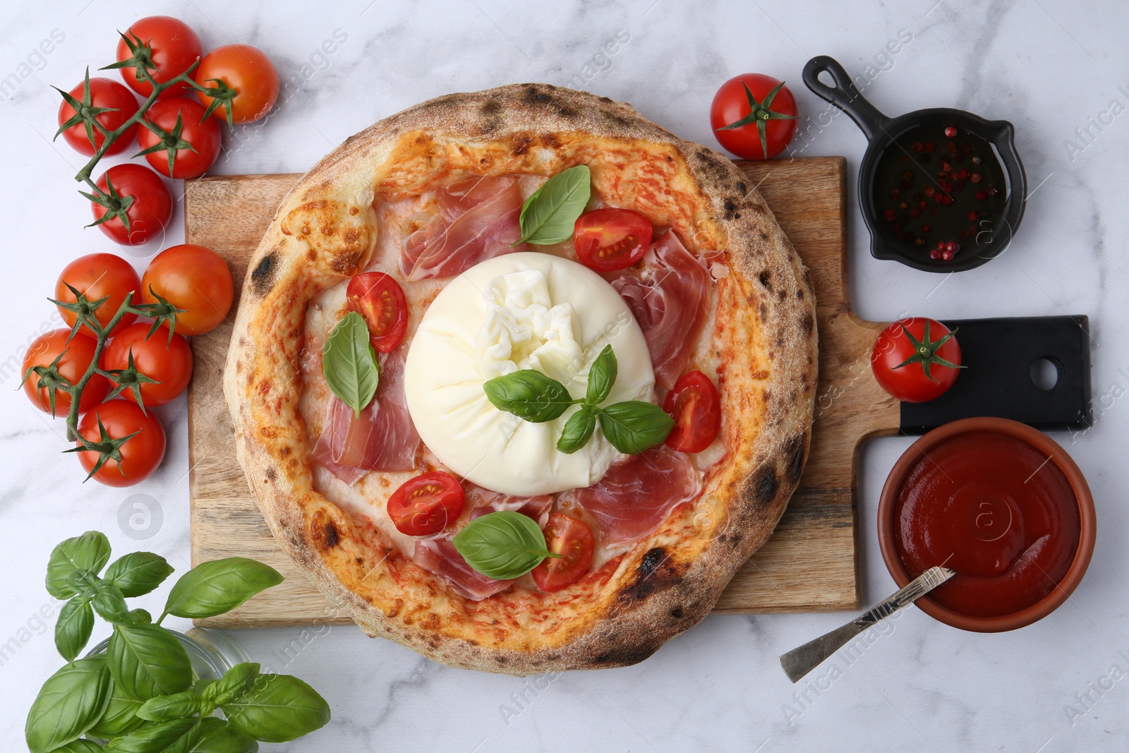 Photo of Delicious pizza with burrata cheese on white marble table, top view