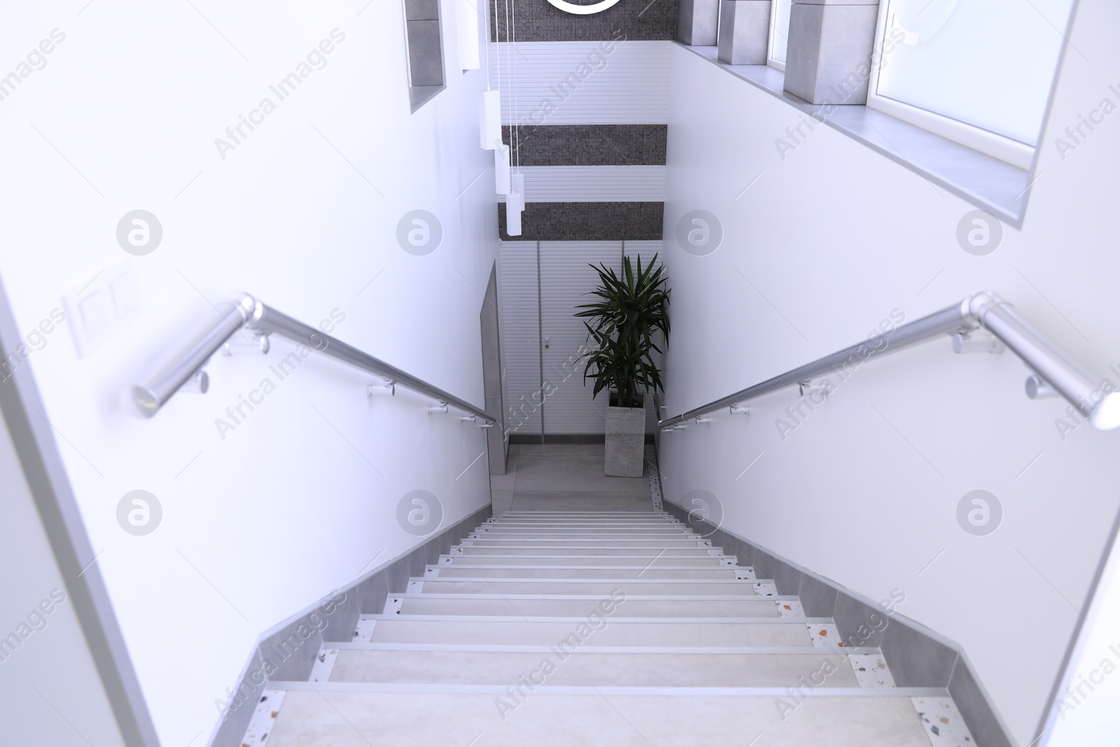 Photo of View of steps and plant in hospital corridor