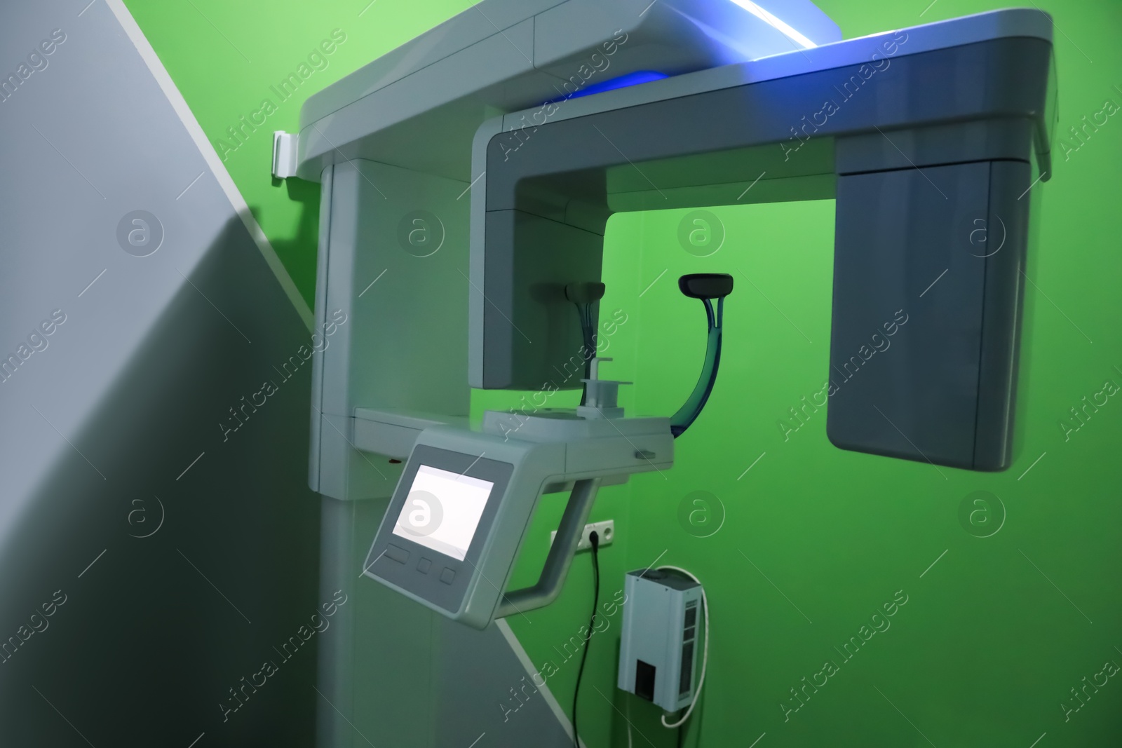 Photo of Modern medical fluoroscopy machine in dentist's office