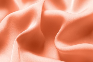 Colorful crumpled silk fabric as background, closeup