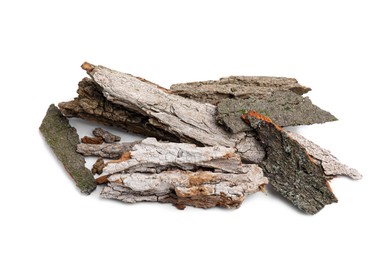 Photo of Heap of tree bark pieces isolated on white