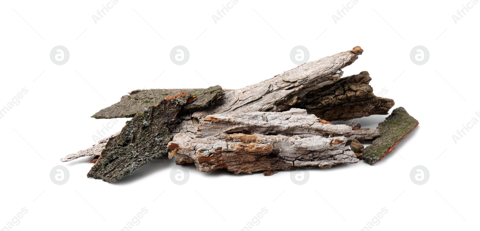 Photo of Heap of tree bark pieces isolated on white