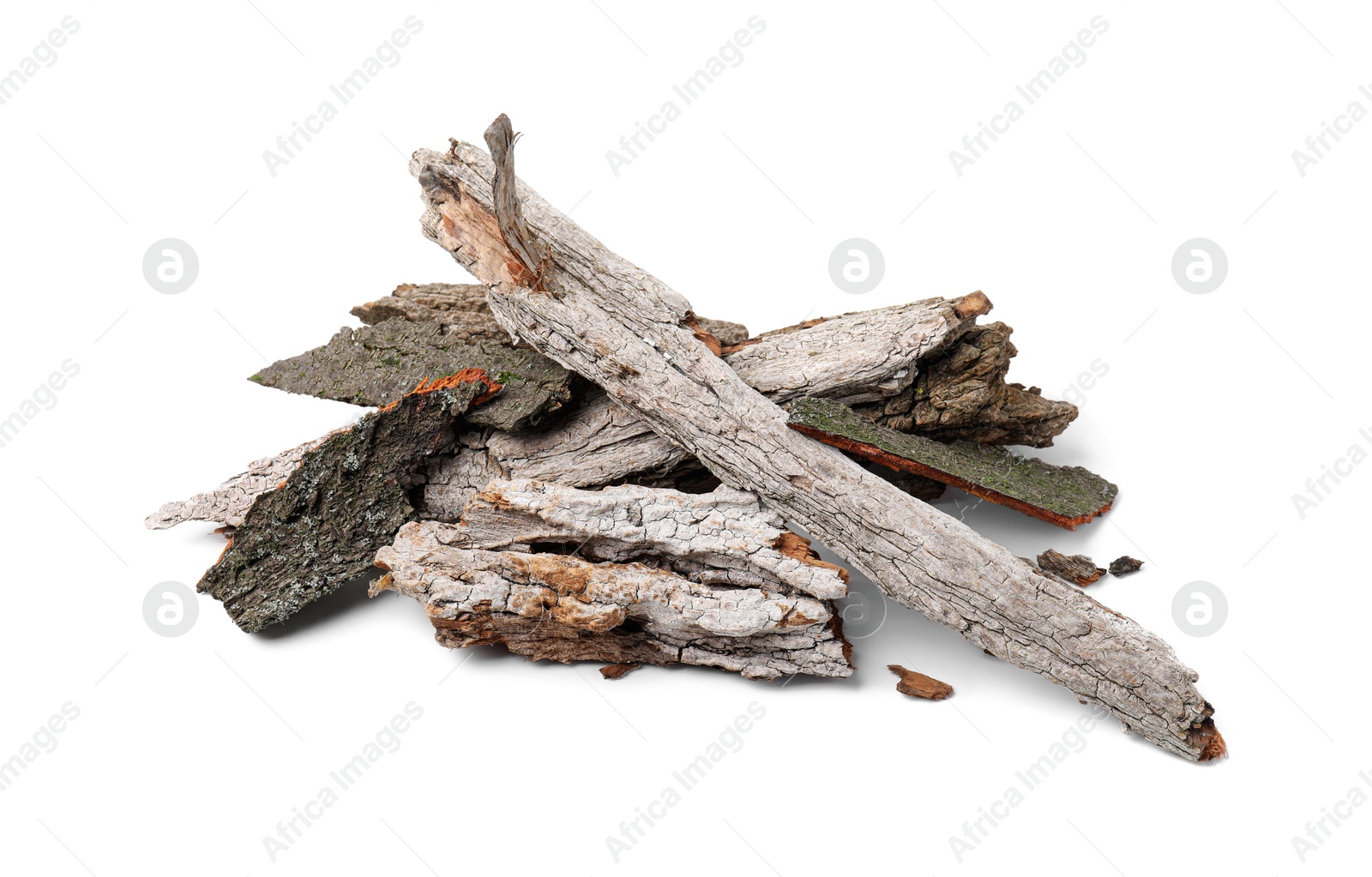 Photo of Heap of tree bark pieces isolated on white