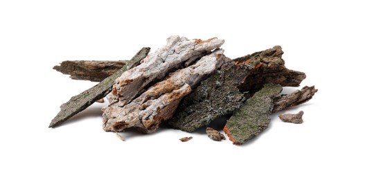 Photo of Heap of tree bark pieces isolated on white