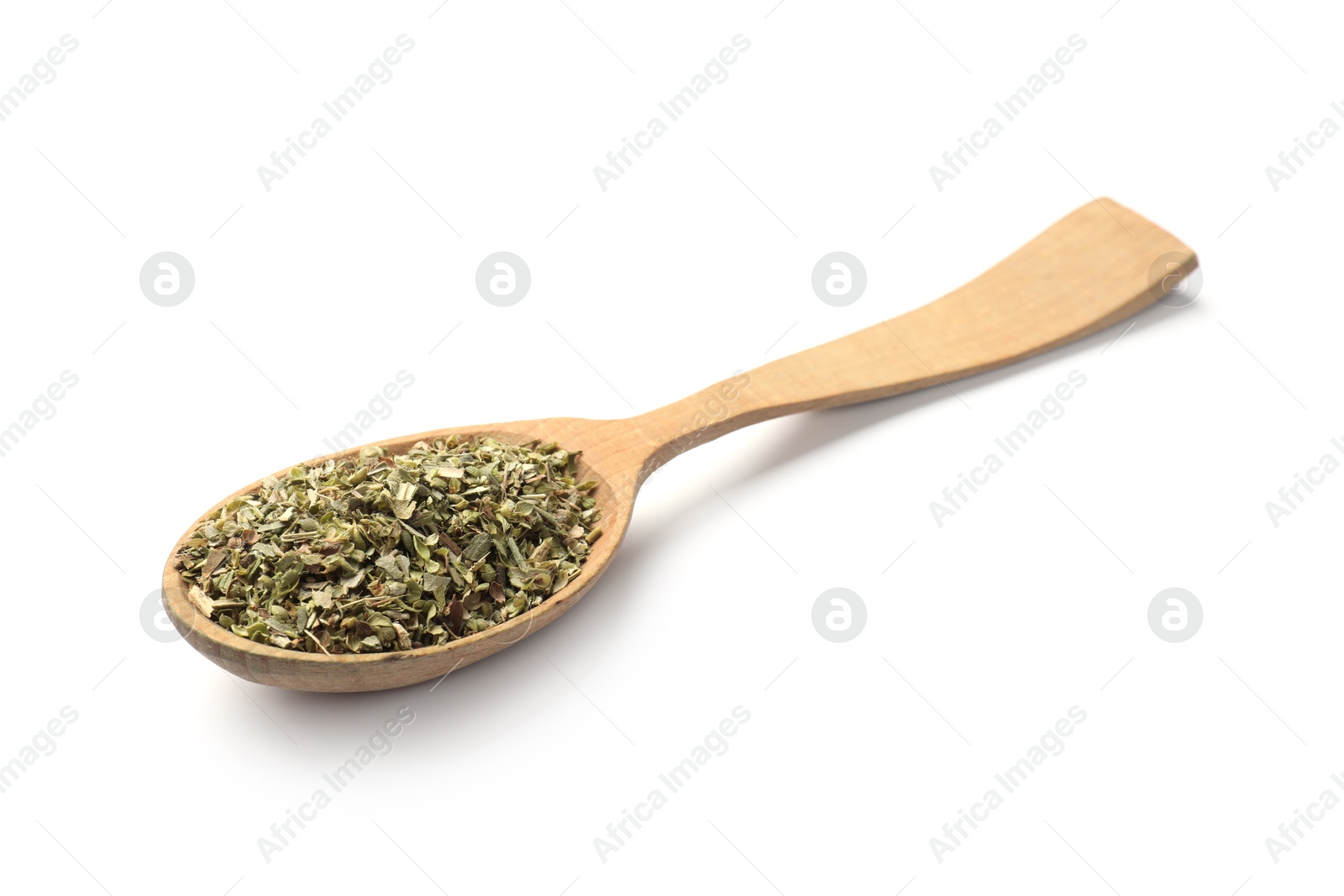 Photo of Dried oregano in wooden spoon isolated on white