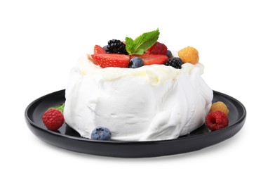 Photo of Pavlova cake (meringue dessert) with whipped cream, fresh berries and mint isolated on white