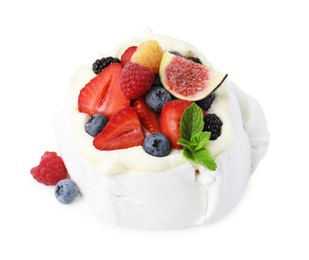 Photo of Pavlova cake (meringue dessert) with whipped cream, fresh berries, mint and fig isolated on white