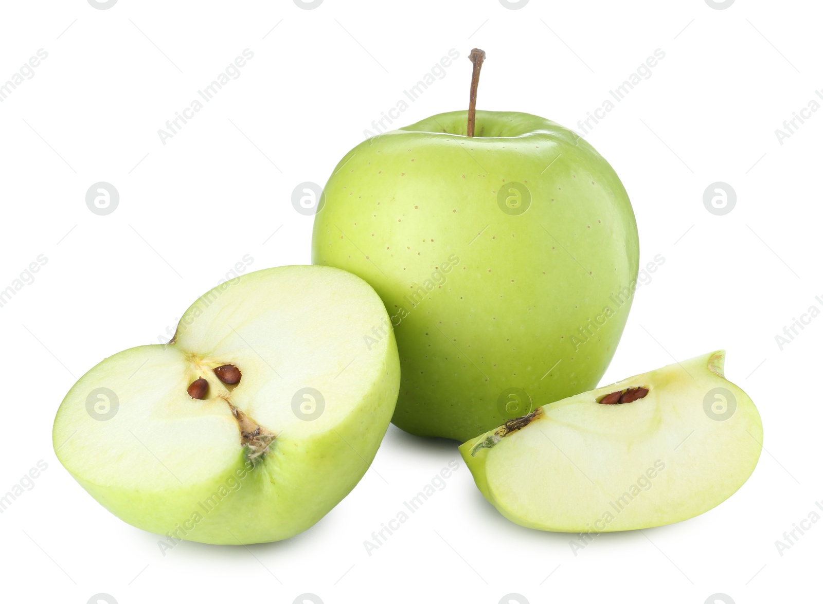 Photo of Whole and cut fresh green apples isolated on white