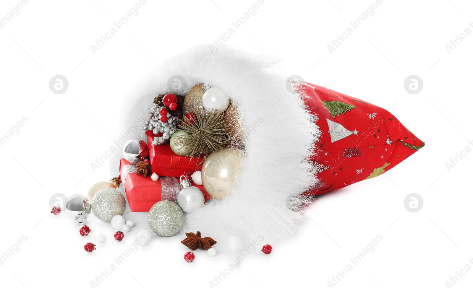 Photo of Santa Claus bag with gift boxes and Christmas balls isolated on white