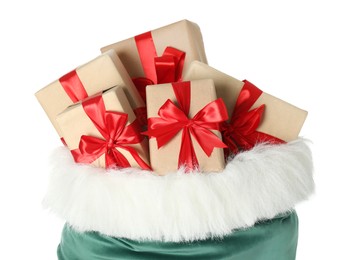 Photo of Santa Claus bag with gift boxes isolated on white