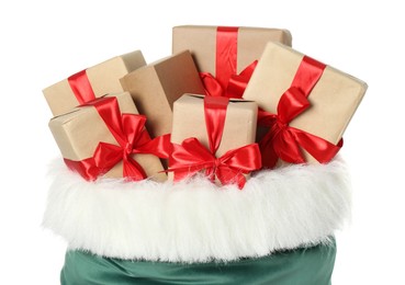 Photo of Santa Claus bag with gift boxes isolated on white