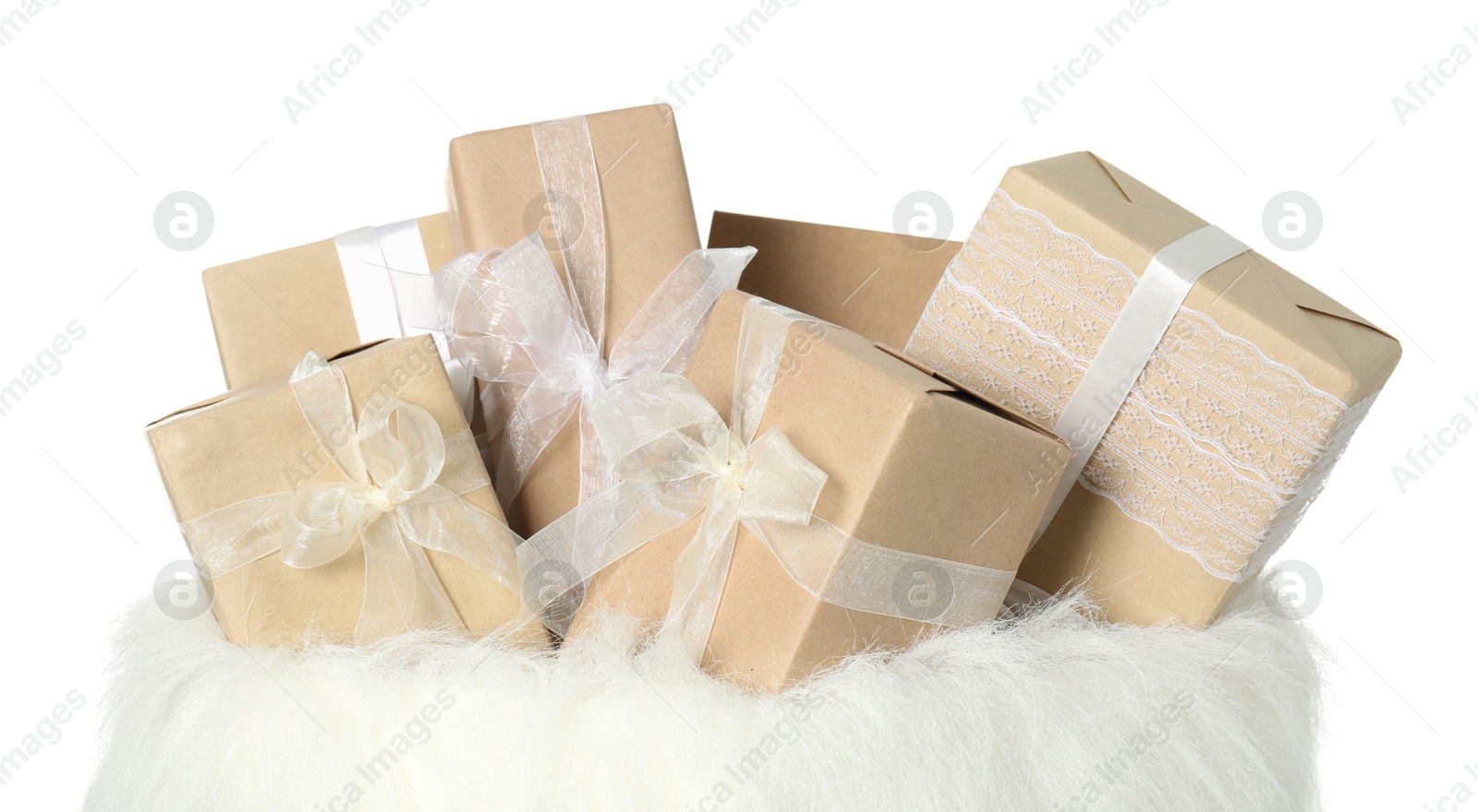 Photo of Santa Claus bag with gift boxes isolated on white