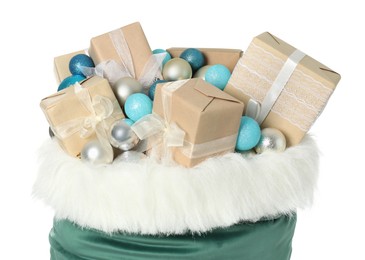 Photo of Santa Claus bag with gift boxes and Christmas balls isolated on white