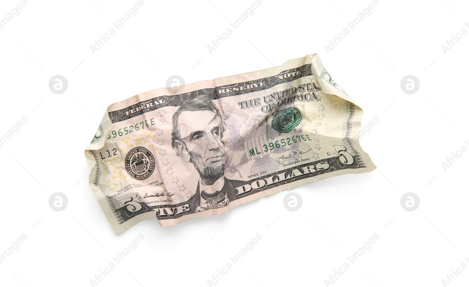 Photo of One crumpled dollar banknote isolated on white, top view