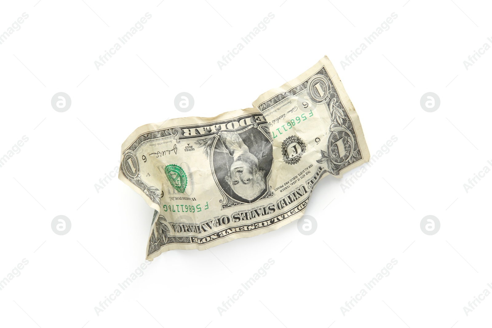 Photo of One crumpled dollar banknote isolated on white, top view