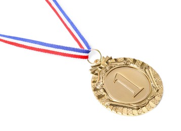 Photo of One golden medal with ribbon isolated on white