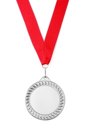 Photo of One silver medal isolated on white, top view