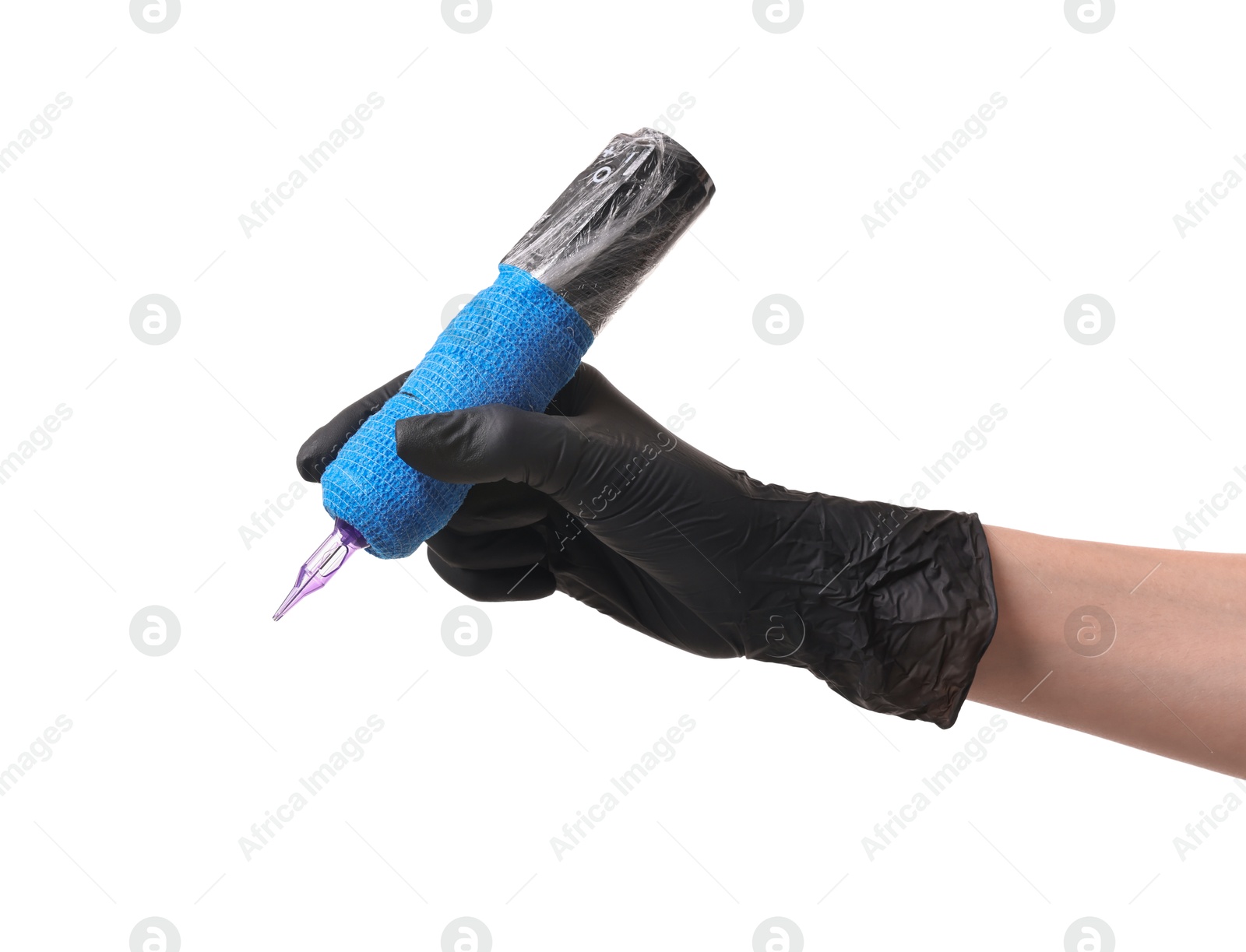 Photo of Professional artist in gloves holding tattoo machine on white background, closeup