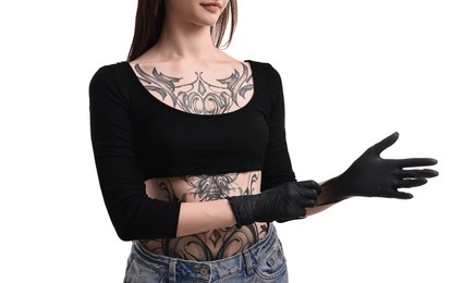 Photo of Professional tattoo artist wearing gloves on white background, closeup