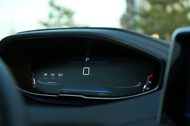 Photo of Dashboard inside of modern luxury car, closeup