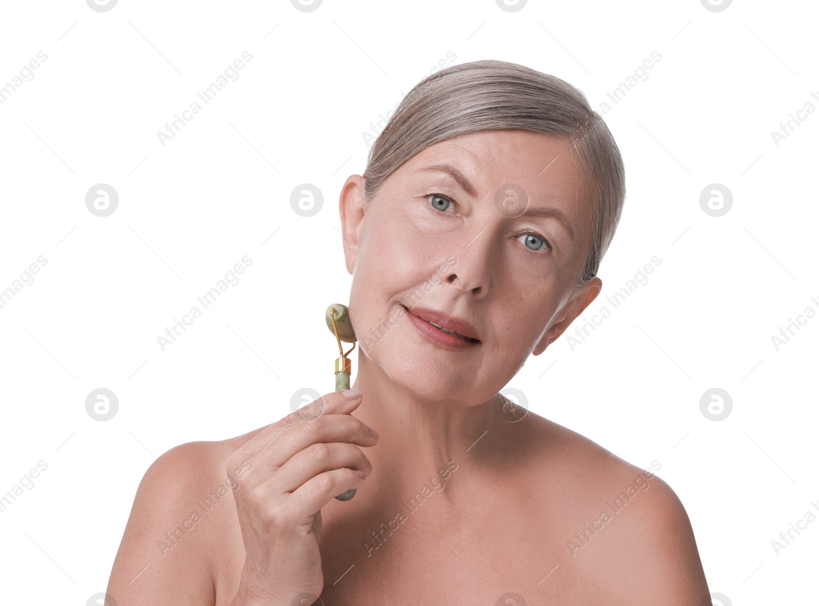 Photo of Beautiful woman doing facial massage with roller on white background