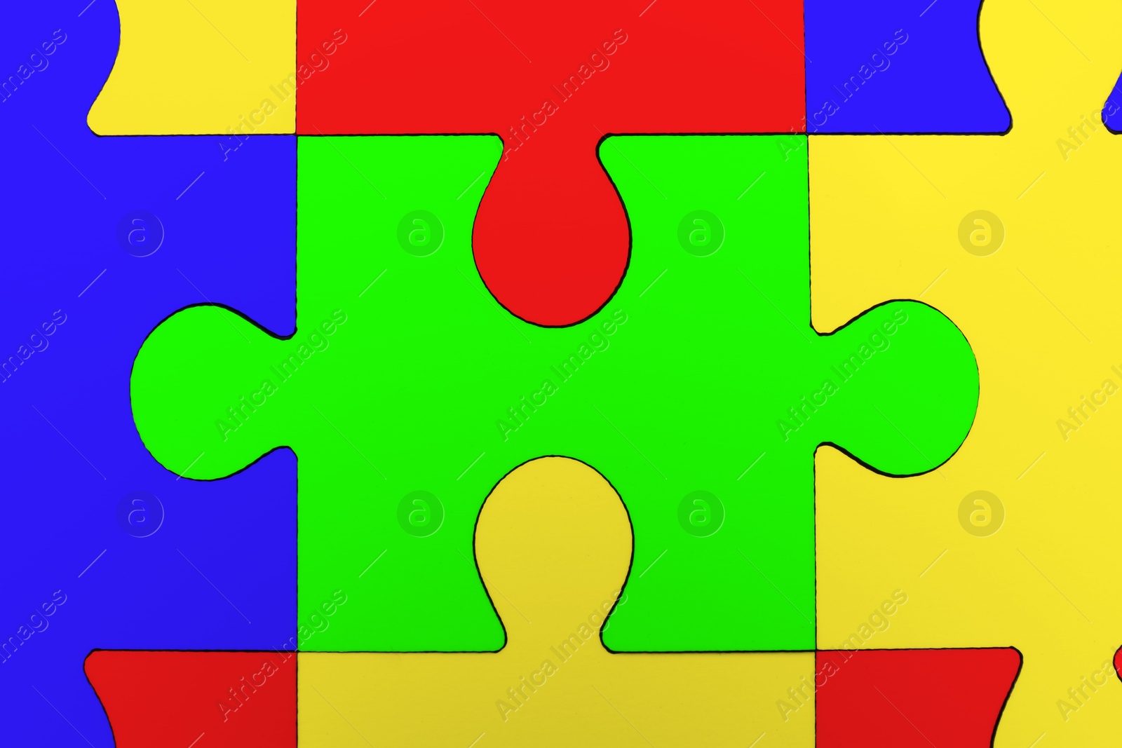 Image of Many colorful puzzle pieces as background. Symbol of autism