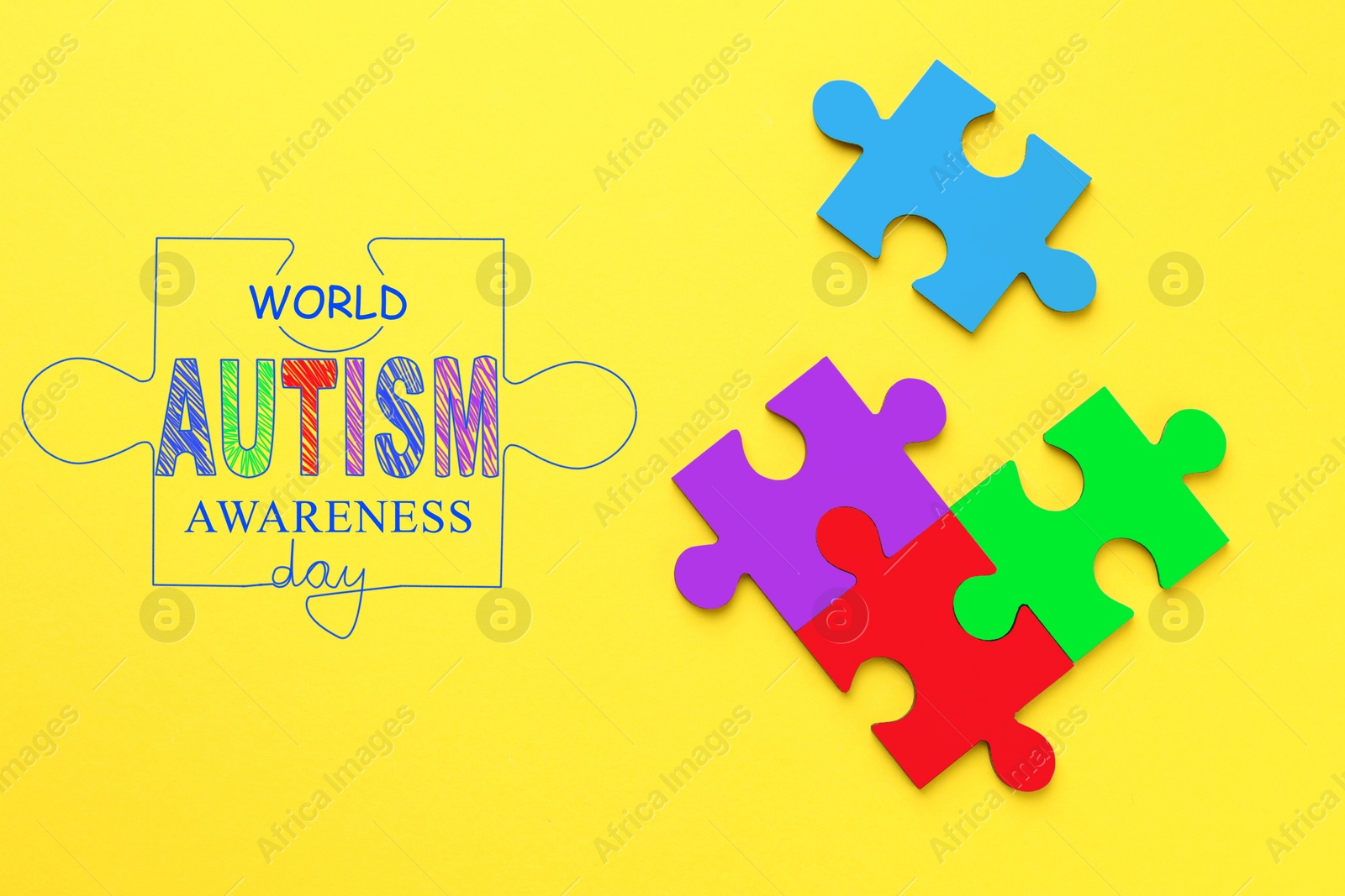 Image of World Autism Awareness Day text and colorful puzzle pieces on yellow background, top view