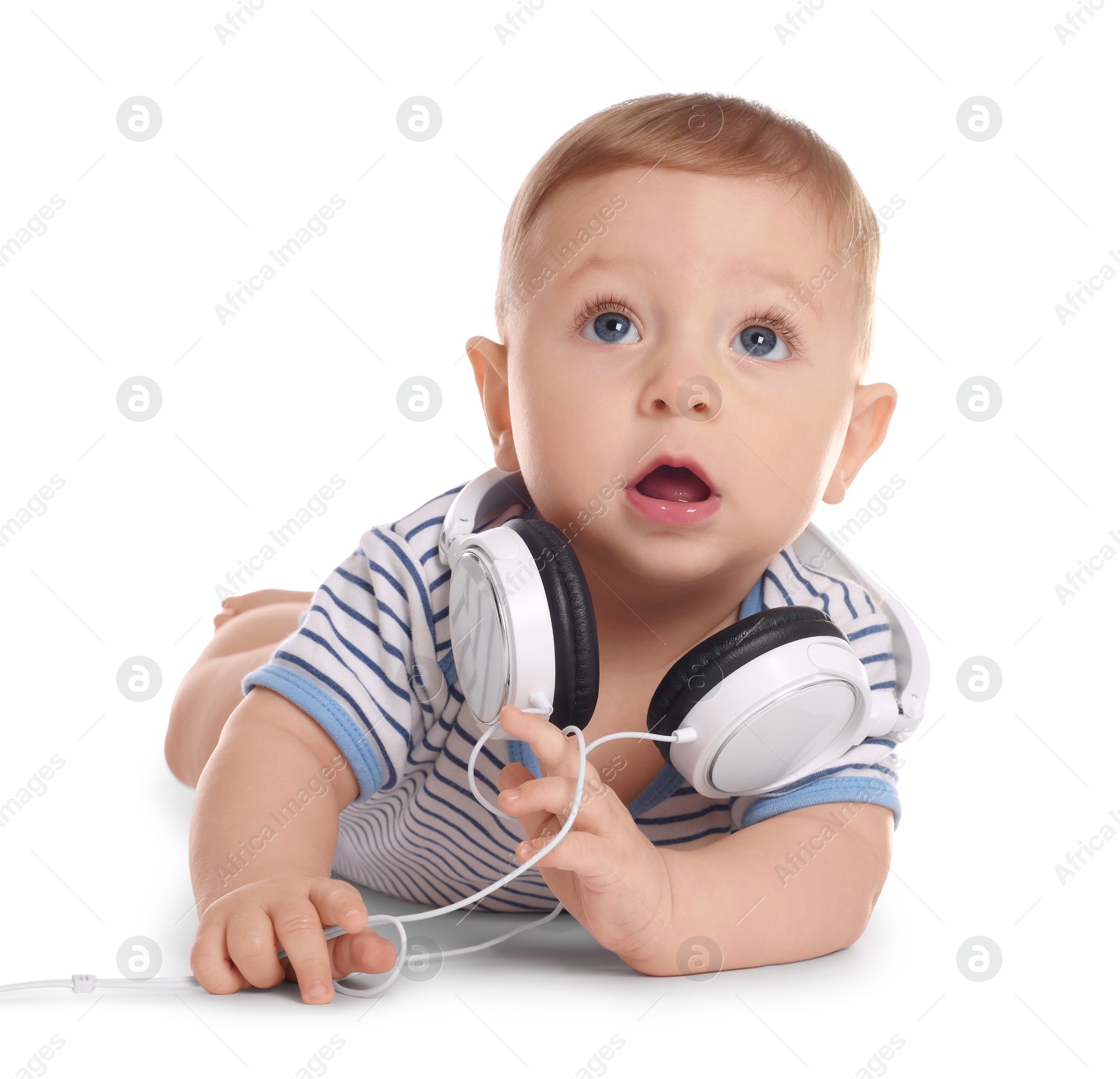 Photo of Cute little baby with headphones on white background