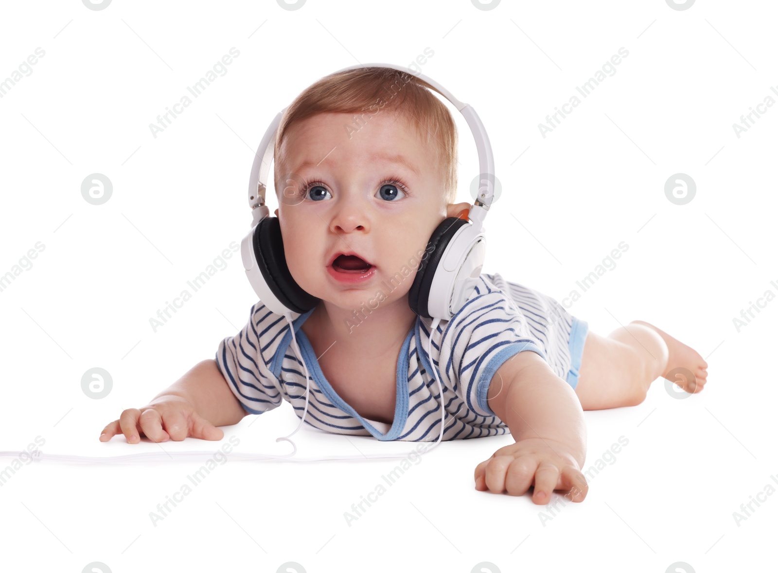 Photo of Cute little baby with headphones on white background