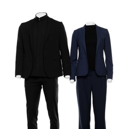 Photo of Female and male mannequins with stylish suits isolated on white