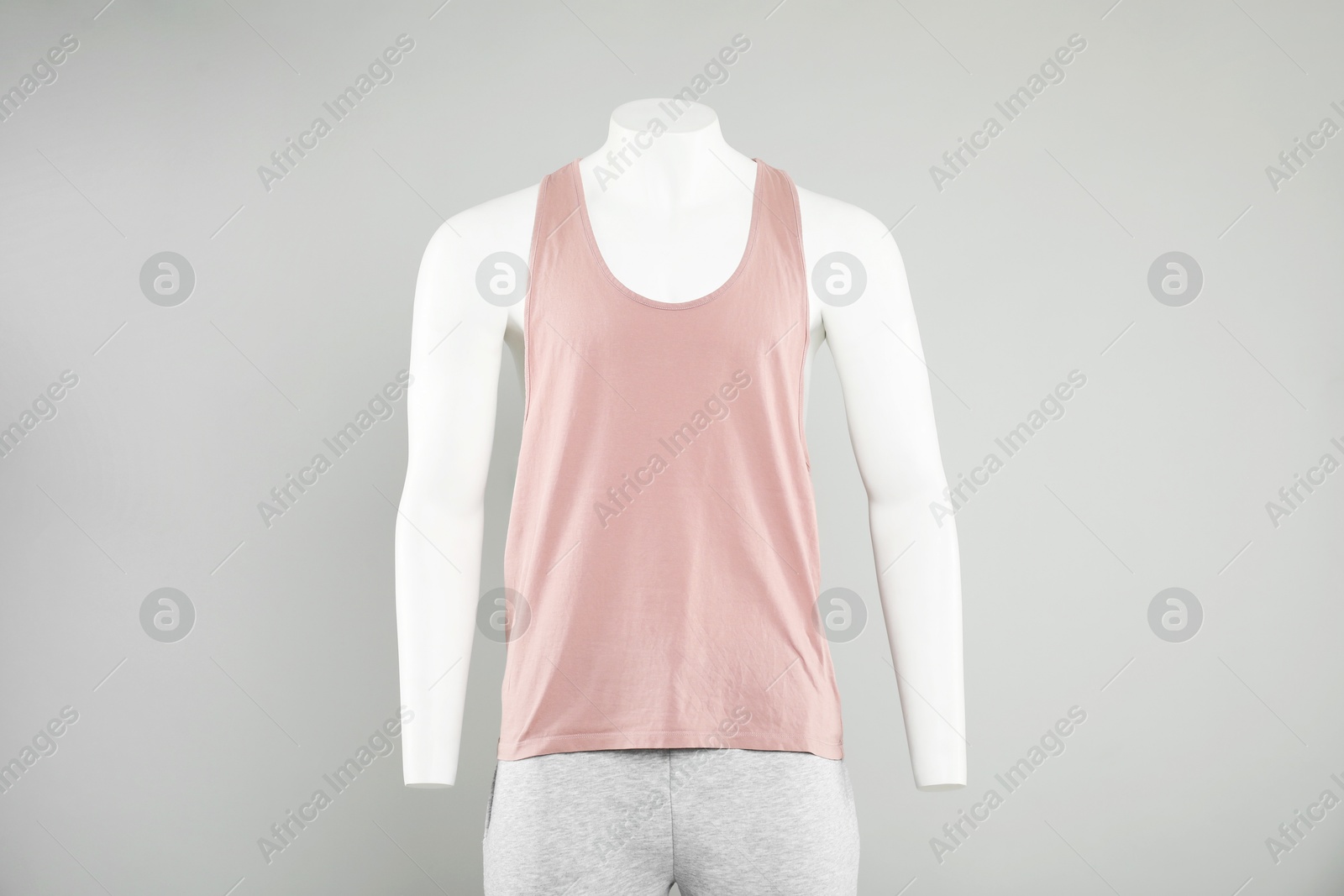 Photo of Male mannequin with stylish sportswear on light background