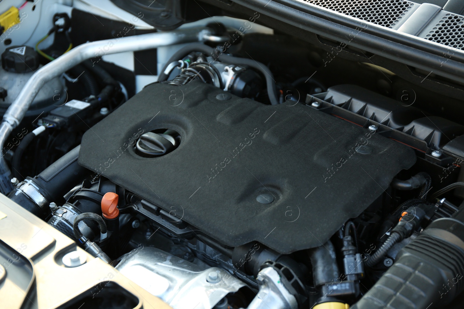 Photo of Closeup view of car engine in modern auto