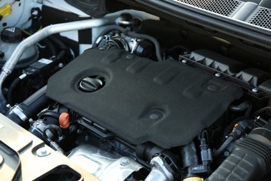 Photo of Closeup view of car engine in modern auto